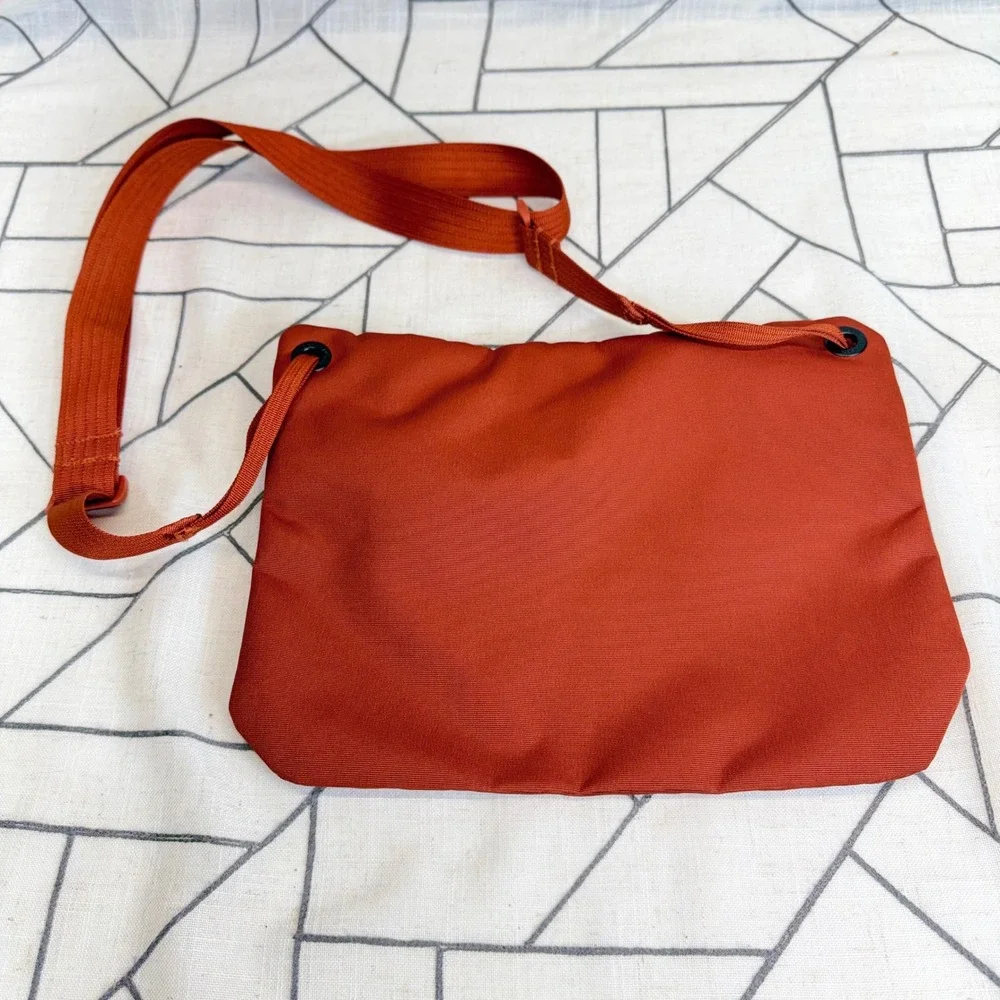 Eagle Creek Explore Sacoche Bag OS Rust Orange Crossbody Travel Pouch EC0A5LQ5